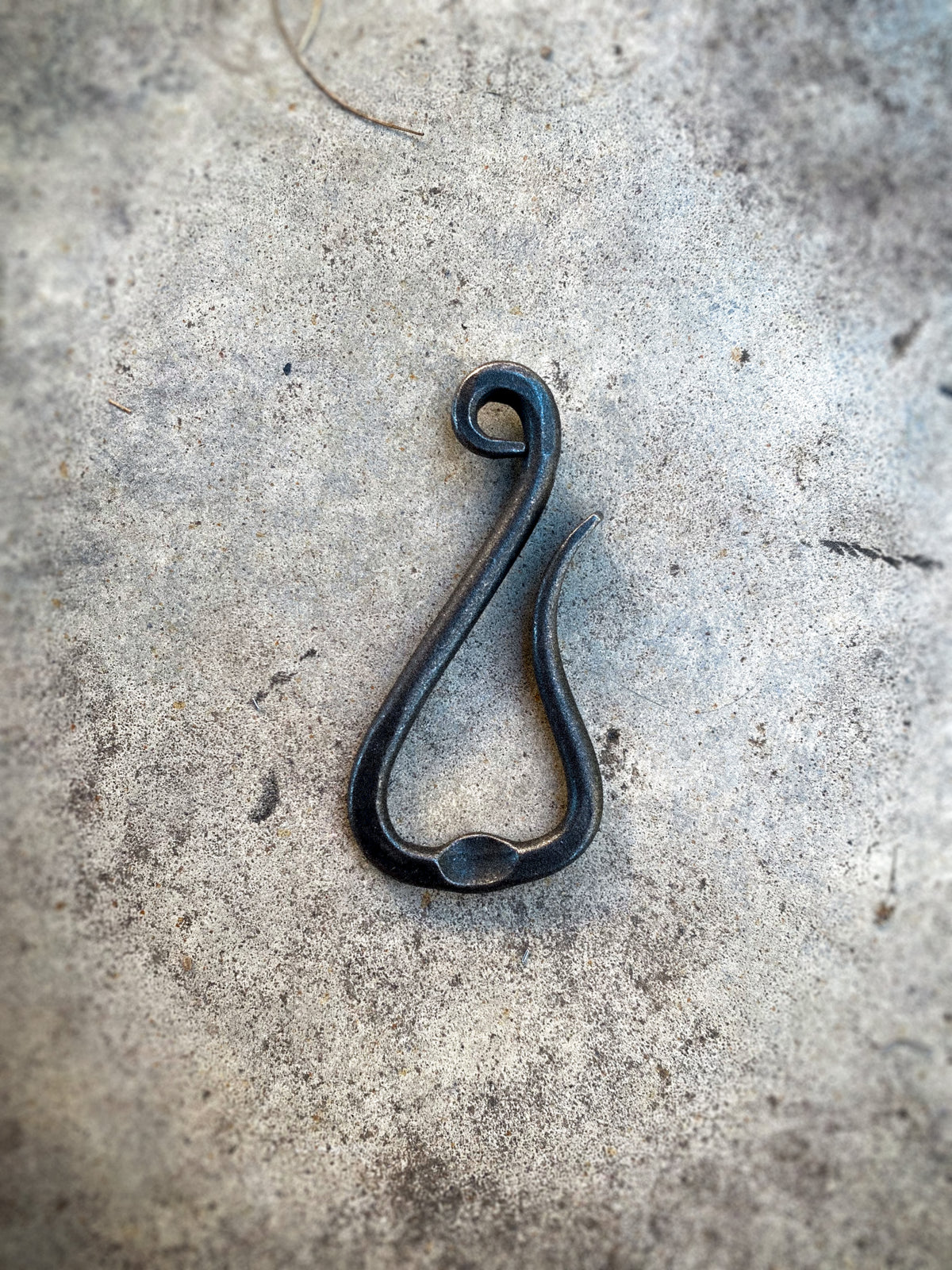 Hand-forged bottle opener keychain . Blacksmith made by Hutton Forge.